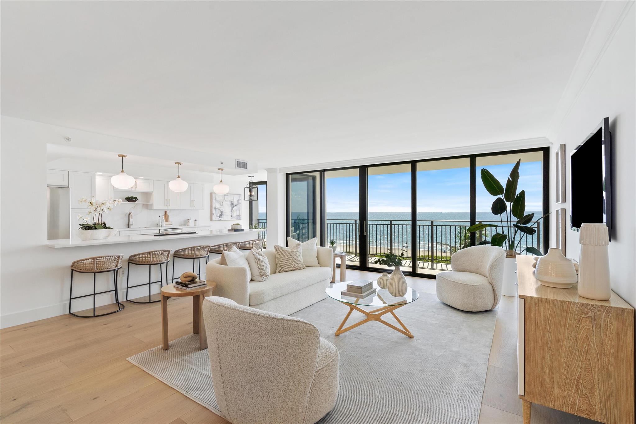 Step into paradise with this newly renovated, luxury 2-bedroom, 2-bathroom condo nestled in an exclusive boutique building directly on the beach. Perfectly situated in one of Boca Raton's most sought-after beachfront enclaves, this elegant residence offers a rare blend of sophisticated design and serene coastal living.Every inch of this stunning condo has been thoughtfully redone with premium finishes, custom details, and a bright, airy layout that brings the ocean indoors. The open-concept living space flows seamlessly to a private balcony where endless ocean views and gentle sea breezes create the perfect escape. A brand new, open plan kitchen boasts top-of-the-line appliances, quartz countertops, and new cabinetry that allows for easy entertaining or quiet evenings at home.
