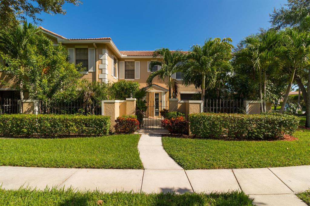 This fully updated, wonderfully appointed, bright & sunny, 2BR/3BA + Den, open-plan spacious townhome shows like a model and is located in the Prestwick Chase community of PGA National. Desirable features include large windows & sliding glass doors, wood-look tile flooring, neutral colors, custom lighting fixtures, an updated eat-in kitchen with white cabinets & stainless steel appliances, a large master suite, updated baths with white cabinets and granite countertops, and a spacious patio surrounded by lush tropical landscaping. PGA National is one of the most sought-after communities in the area and offers many amenities to its residents, including some of the top championship golf courses in the county, tennis courts, parks & fitness trails, enhanced security, community pools, and more.