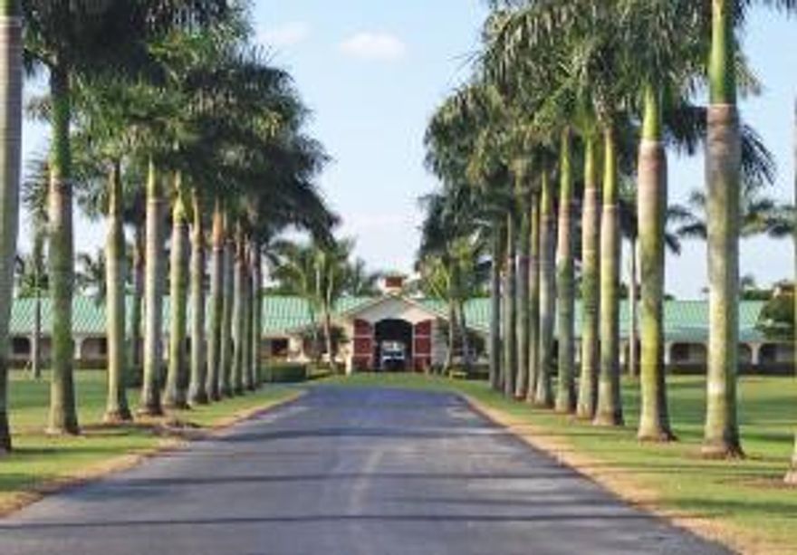 Exceptionally rare opportunity to own property adjacent to International Polo Club and DeerRidge Farms.  Property has been fully upgraded and renovated with top quality finishes throughout. 40 acres professionally landscaped. Sand ring with excellent footings. Private entry gate shared with DeerRidge Farms. 3,200 sq.ft. garage/warehouse includes upstairs 3 bdrm. apt with vaulted ceiling. Owner/Manager apt. contains 2/2 with fireplace, crown molding and custom kitchen. There are also 2 studio apts and a 2/1 apt. Custom trophy room, tack room and locker room. Also features 11 Paddocks, lake and gazebo.