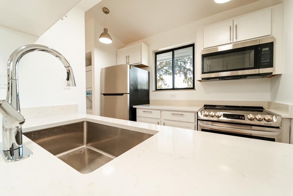 Photo of 833 Club Drive, Palm Beach Gardens, FL 33418 (MLS # R10919159)