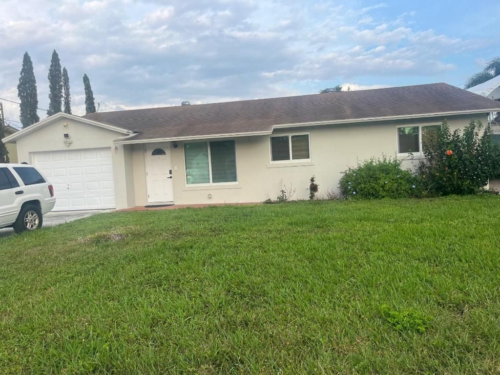 Photo of 4446 Wilkinson Drive, Lake Worth, FL 33461 (MLS # R10974386)
