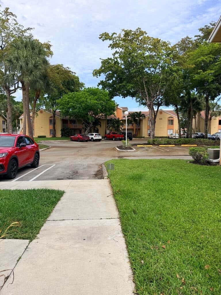 Photo of 998 Coral Club Drive #998, Coral Springs, FL 33071 (MLS # B26018381)