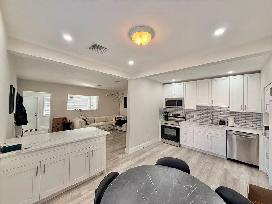 **Moving funds ONLY first month and security deposit**Enjoy this spacious 2-bedroom, 1-bath residence featuring a large private yard and covered carport parking. The property offers two parking spaces and includes all utilities for added convenience and value. Ideally located in a desirable neighborhood just minutes from Downtown, the beach, and Wilton Manors. Pet-friendly with quick and easy approval. A fantastic opportunity in a prime location!