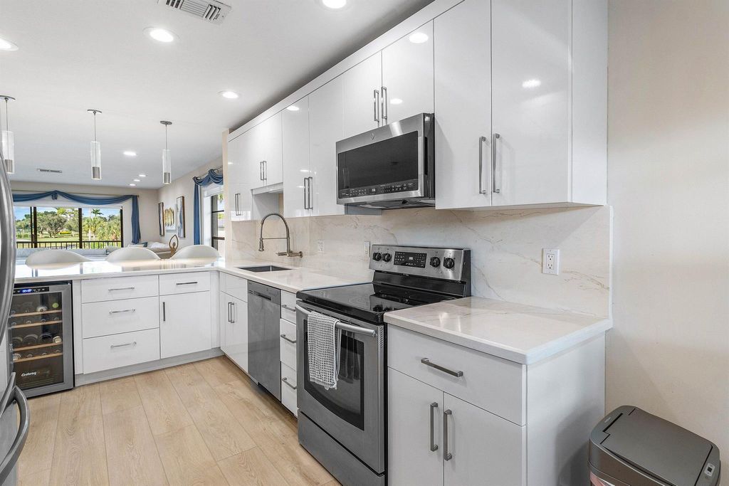 Photo of 35 Southport Lane #H, Boynton Beach, FL 33436 (MLS # R11137222)