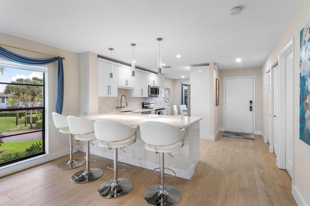 Photo of 35 Southport Lane #H, Boynton Beach, FL 33436 (MLS # R11137222)