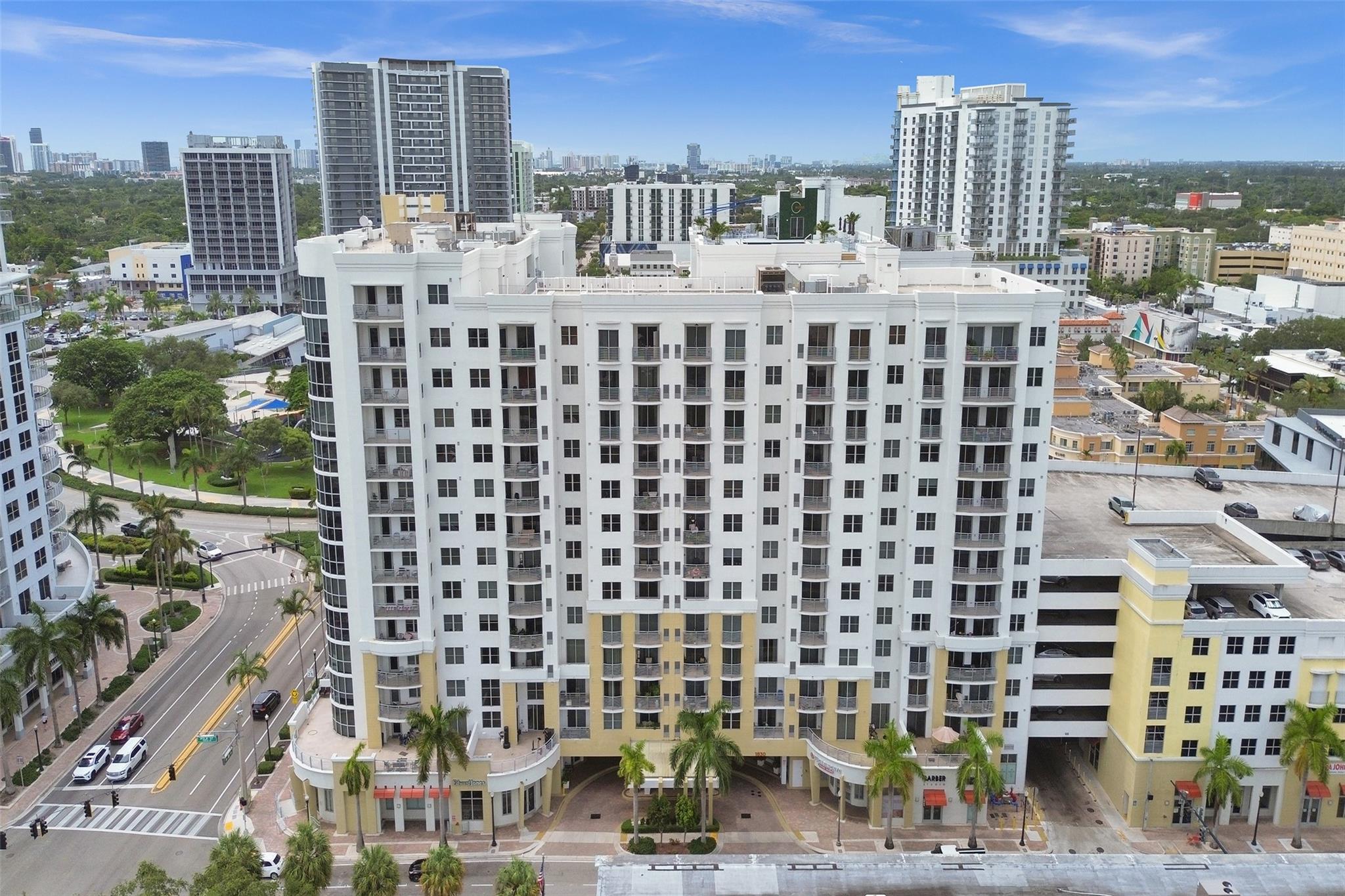 Beautiful 1BR/1BA 815 sq ft condo on 10th floor, centered in the middle of downtown Hollywood's hottest redevelopment area. Gorgeous porcelain floors throughout. Open flr plan, w/granite counters & ss appliances in kitchen. Spacious BR & liv. area w/dual entrance to balcony. Impact windows & doors. Oversized bath w/sep shower & soaking tub. Large walk-in closet. Washer & dryer inside unit. Pet friendly building. Amenities include movie theatre, newly renovated rooftop pool area, party room, 24/7 security, business office, sauna, gym/pilates & game room. Valet or self parking in attached elevated garage. Walk to Artspark, restaurants & nightlife, Publix & Post Office. Within minutes drive to award winning tropical Hollywood beach, FLL airport & Hard Rock. Well maintained bldg. Ok to lease.