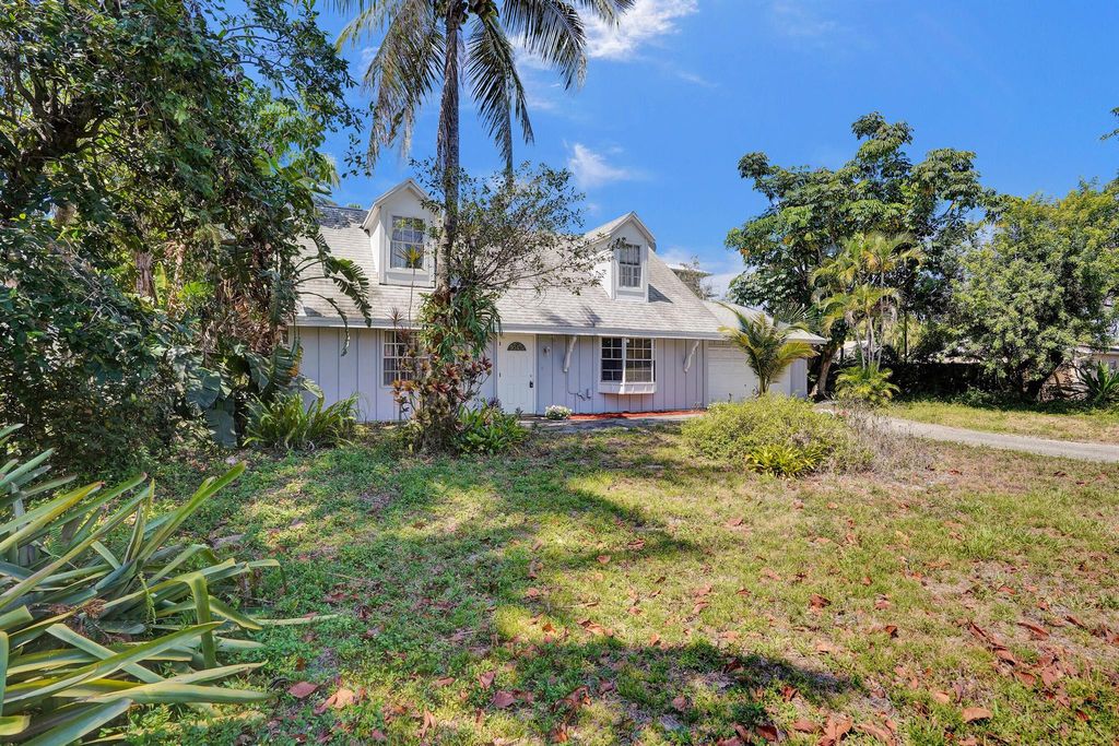 Photo of 1724 Boardman Avenue, Mangonia Park, FL 33407 (MLS # R11093071)