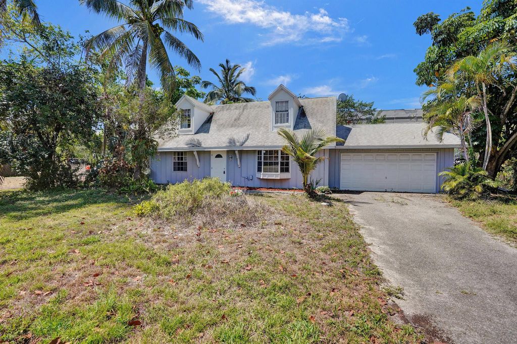 Photo of 1724 Boardman Avenue, Mangonia Park, FL 33407 (MLS # R11093071)