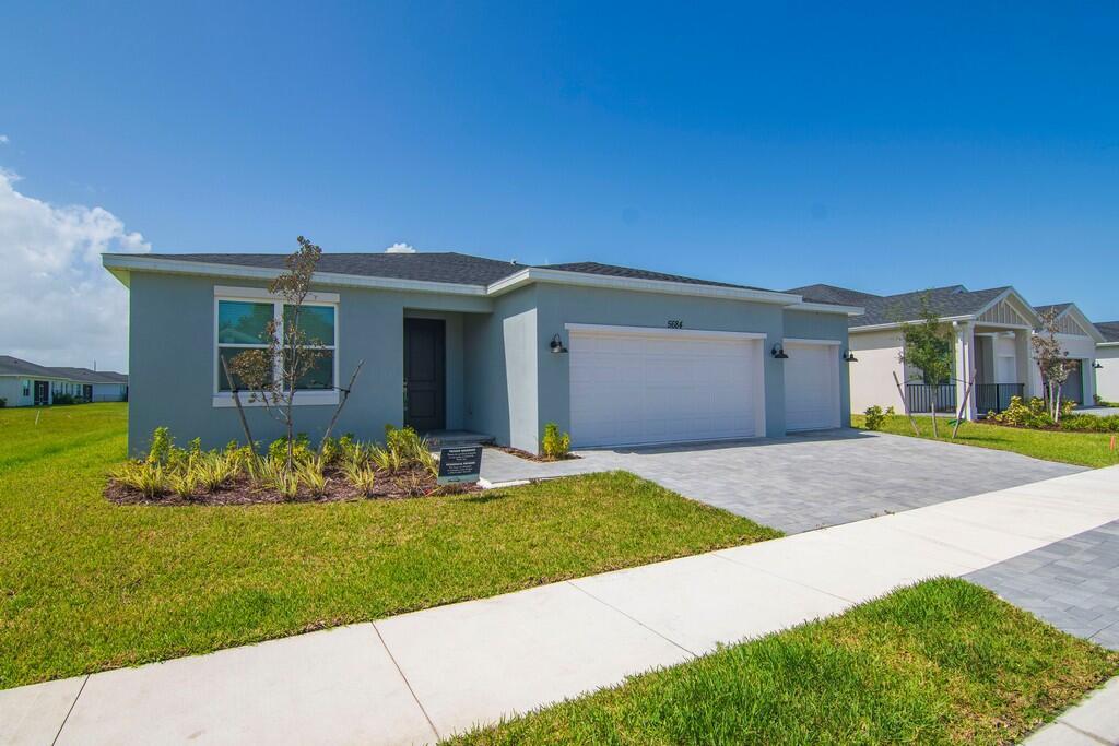 Brand new and never lived in, this stunning 4 bedroom, 3 bath home in Hampton Park offers 2,493 sq ft of modern living with a versatile flex room and spacious 3-car garage. Soaring ceilings, open living areas, and designer finishes create a fresh, inviting feel. Enjoy breathtaking long lake views from your backyard, perfect for relaxing or entertaining. A rare opportunity to rent a move-in ready home in one of Vero Beach's most desirable communities.