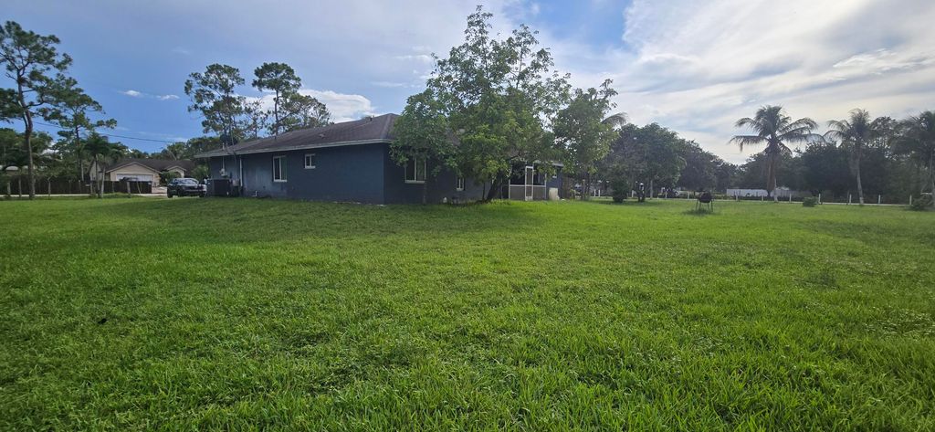Photo of 17999 N 46th Court N, The Acreage, FL 33470 (MLS # B26049388)