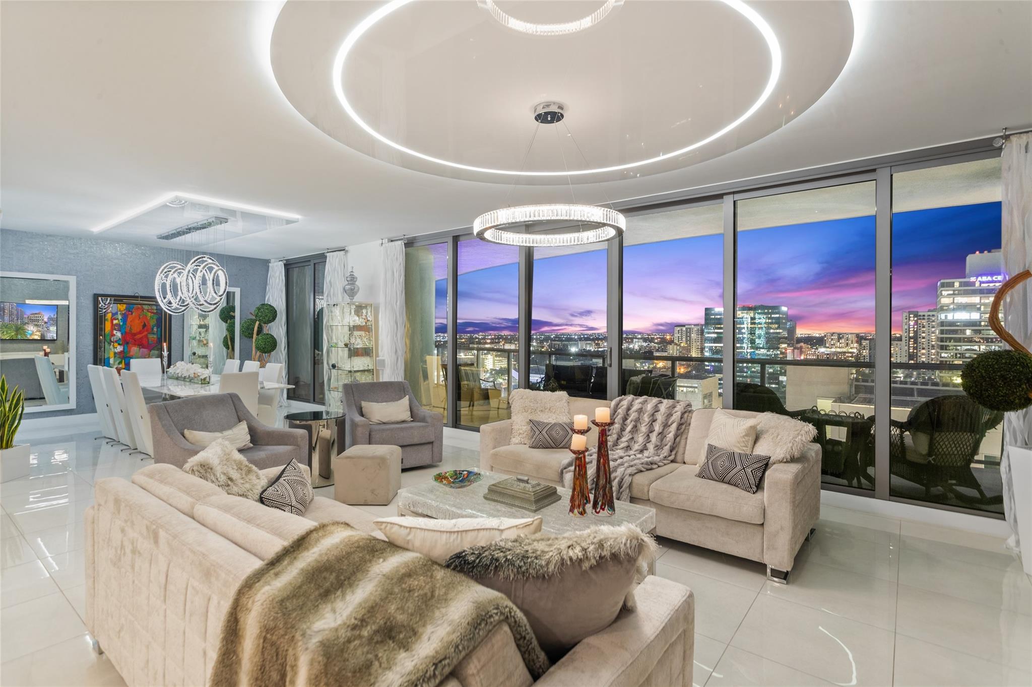 Step into this designer-inspired corner residence, Nestled in the prestigious Las Olas district, Features 3 bedrooms 2.5 bathrooms, no detail has been left untouched. The unit boasts numerous upgrades, including custom indirect lighting that sets a sophisticated tone throughout. Seamless flow of the open floor plan, transitioning effortlessly from the living area to the dining space, and into the state-of-the-art kitchen. Here, you'll find European cabinetry, stainless steel appliances, and elegant quartz countertops, making it a chef's dream. Floor-to-ceiling windows illuminate the space with natural light and lead to an expansive balcony, perfect for entertaining or simply relaxing. Revel in the vibrant ambiance of Fort Lauderdale lifestyle.