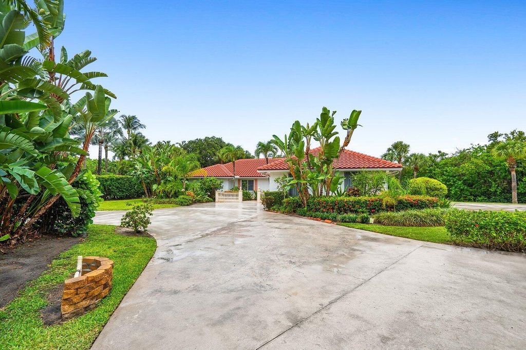 Photo of 12299 Channel Drive, North Palm Beach, FL 33408 (MLS # R11105420)