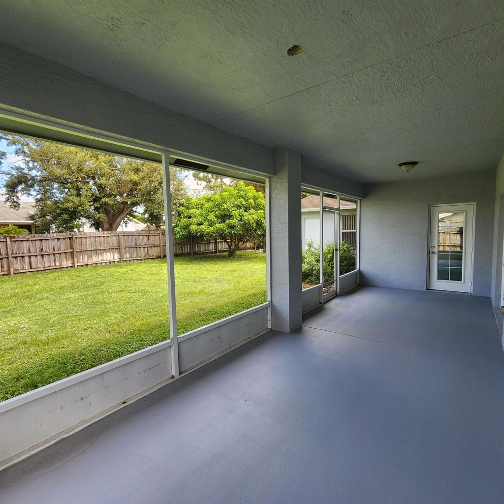 Photo of 451 SW Laconic Avenue, Port Saint Lucie, FL 34953 (MLS # R10966858)