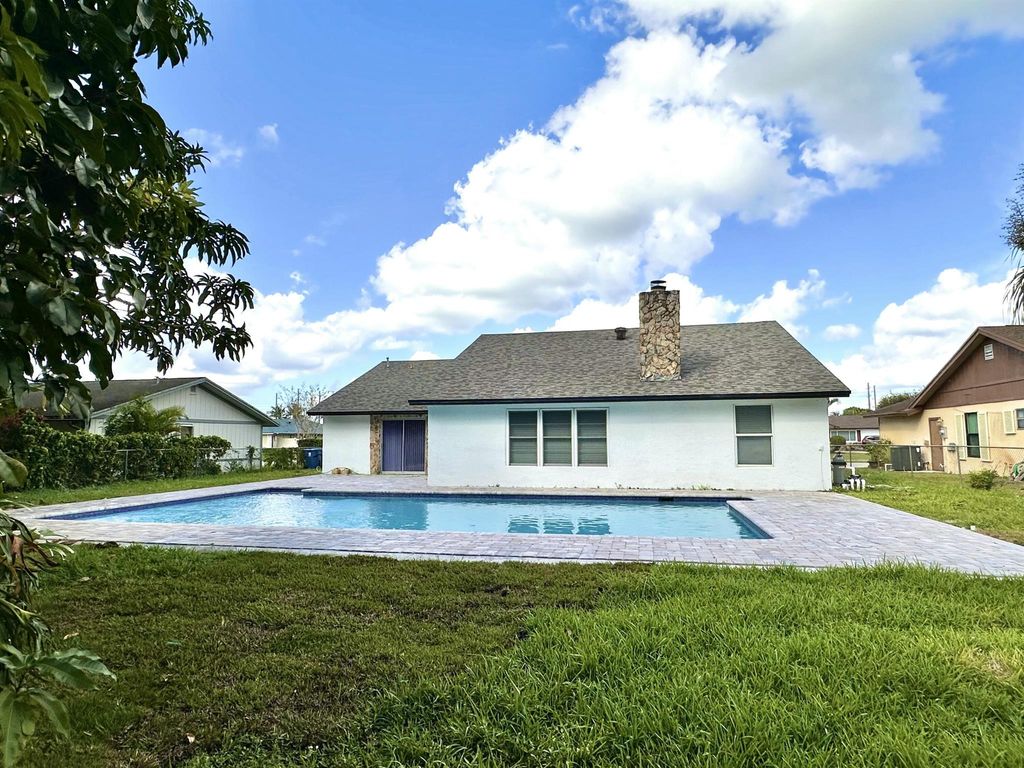 Photo of 127 Cordoba Circle, Royal Palm Beach, FL 33411 (MLS # R11135507)