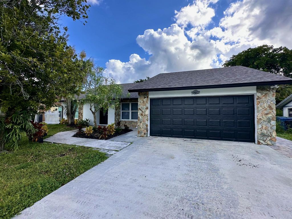 Photo of 127 Cordoba Circle, Royal Palm Beach, FL 33411 (MLS # R11135507)