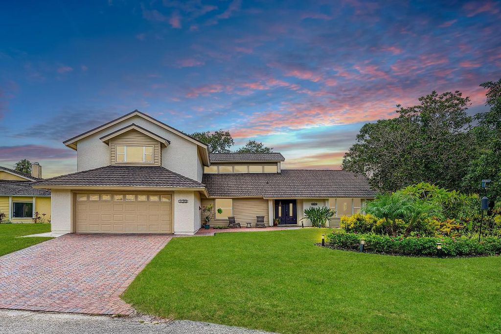 Photo of 7100 Lorraine Court, Port Saint Lucie, FL 34952 (MLS # R11127018)