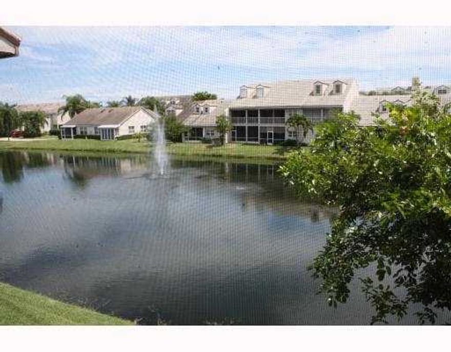 UPDATED TOWNHOME, WATERVIEWS OF LAKE, WALK TO INTRACOASTAL AND POOL AND GAZEBO ON THE INTRACOASTAL, GREAT UNIT. GATED COMMUNITY, SECURITY ALARM INCLUDED.