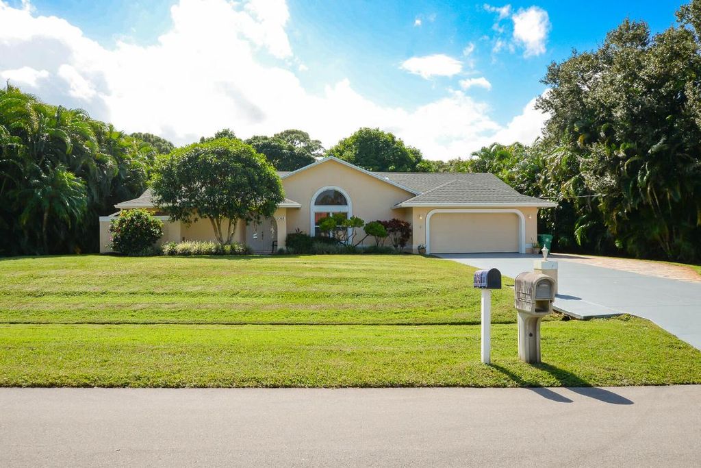 Photo of 3068 SE Darien Road, Port Saint Lucie, FL 34952 (MLS # R11133235)