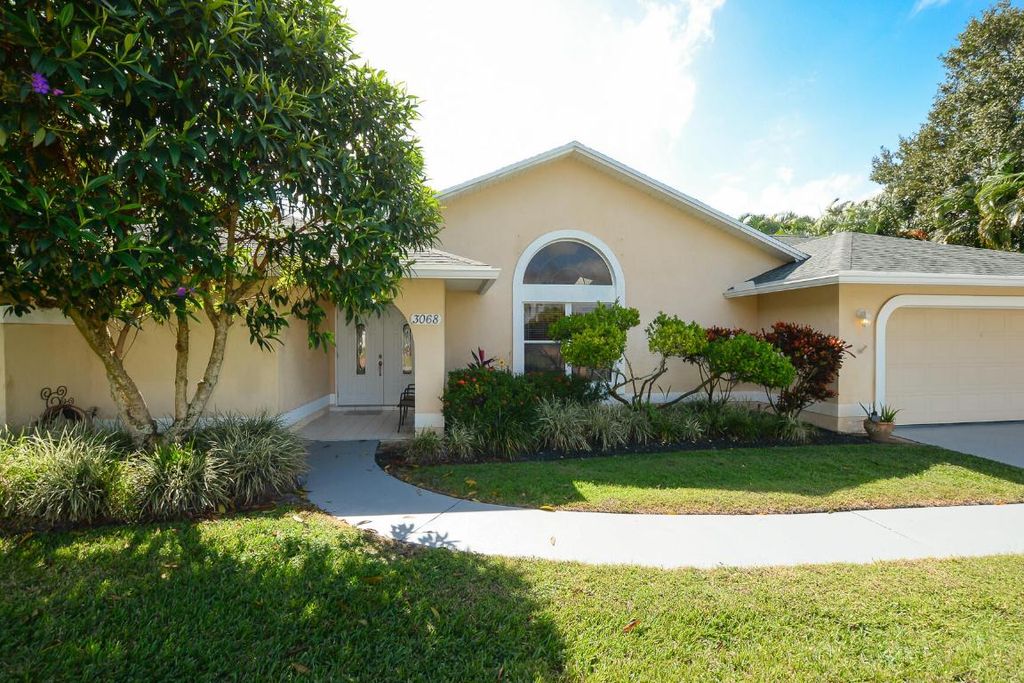 Photo of 3068 SE Darien Road, Port Saint Lucie, FL 34952 (MLS # R11133235)