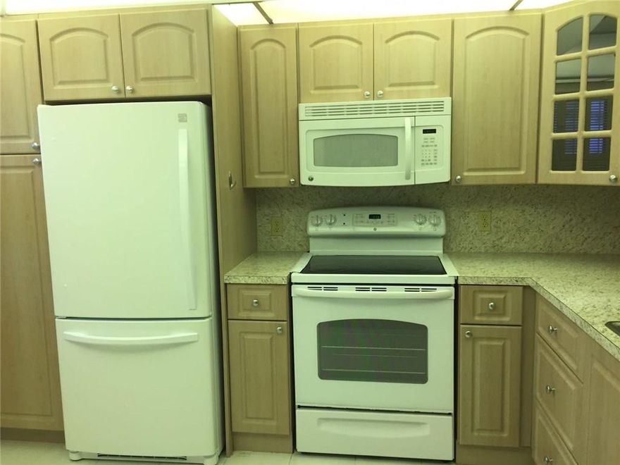 REDUCED. MOTIVATED SELLER. WILL ACCEPT REASONABLE OFFERS.   LOCATION LOCATION LOCATION,  2BED 2BATH OVERLOOKING THE CANAL AND GARDENS. WALK TO THEATER, GYM AND MAIN SWIMMING POOL, RENOVATED KITCHEN, NEWER APPLIANCES, LAMINATE FLOORS, LOVELY VIEW. MOVE TO OUR GOLF AND COUNTRY CLUB COMMUNITY AND ENJOY OUR AMAZING LIFESTYLE. 1000 SEAT THEATER, GYM, RESTAURENT ON SITE, DOCTORS OFFICE OVER 150 CLUBS, BUSNINESS CENTER, HUGE POOL ROOM AND MUCH MORE.