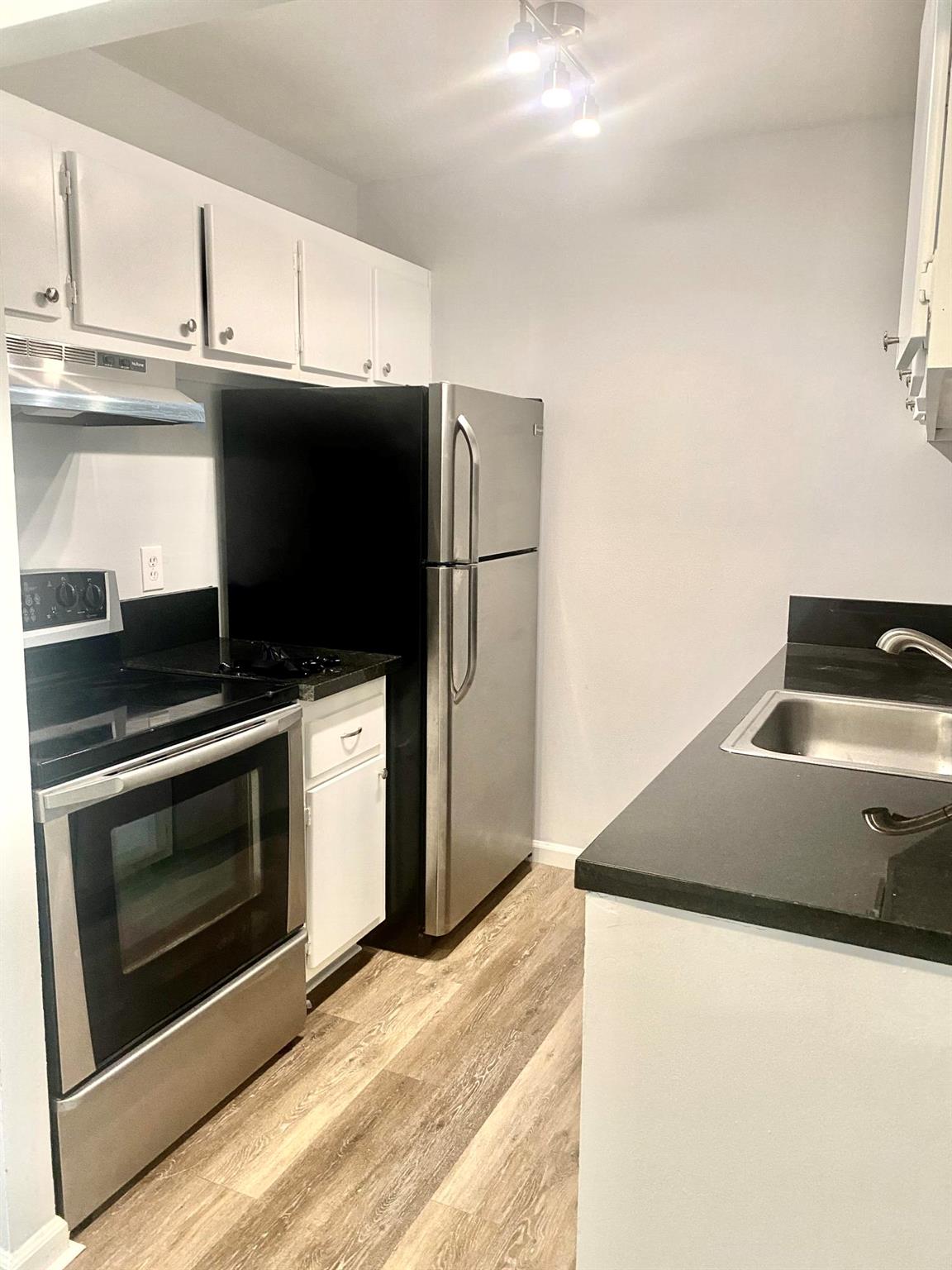 Cozy and bright second floor condo 1bedroom 1bath-Large and spacious with separate dinning area. Corner unit.Laminate floors. Updated kitchen- Beautiful view to the pool from Balcony. Laundry Facilities. Great community close to I-95. Palm Beach Outlets. No pets allowed by Association. and WATER is included in the rent !