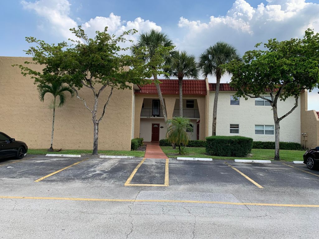 Photo of 132 Lake Evelyn Drive, West Palm Beach, FL 33411 (MLS # R10801289)