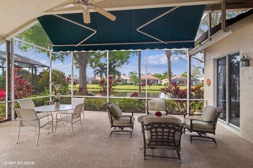 TAKE A SECOND LOOK!NEW ROOF & GUTTERS FEB. 2025! NEW SS OVEN, COOK TOP & MICROWAVE FEB. 2025 & NEW LAMINATE FLOORS IN 2 BEDROOMS INSTALLED FEB. 2025. Welcome to this beautiful Sawgrass floor plan located in highly desirable PGA VILLAGE, offering breathtaking lake views and an abundance of space. As you enter, you're greeted by a spacious Living room with adjacent formal dining area & a bright open kitchen featuring stainless steel appliances, sleek granite countertops, a cozy breakfast nook, and a convenient snack bar--perfect for entertaining or enjoying everyday meals. The master suite is a true retreat, with a private sitting area and sliding doors that open to the peaceful covered lanai, where you can unwind while enjoying the serene surroundings. The lanai is enhanced with an