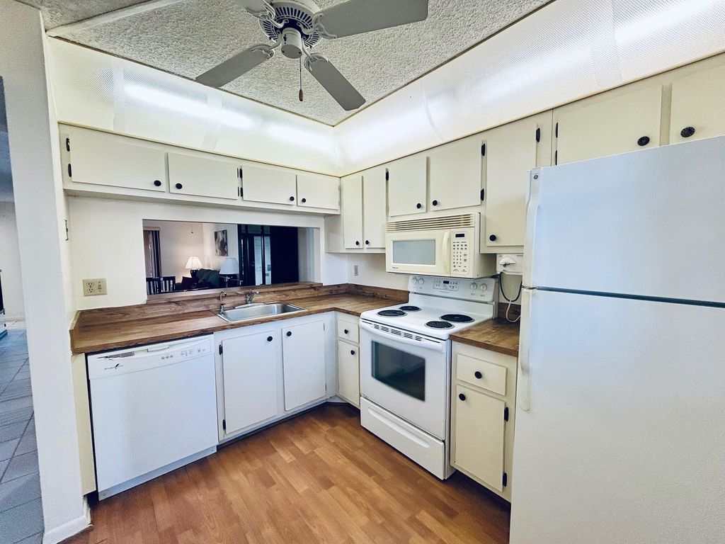 Photo of 7214 Golf Colony Court #101, Lake Worth, FL 33467 (MLS # R11162801)