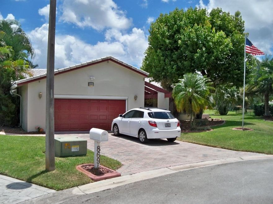 * A true 2612sf under air, canal lot pool home, no busy road, ultra quiet no traffic street*This is one of Ramblewood South's finest and largest 4 bedroom home situated on just over 1/4 acre waterfront on a cul de-sac lot.  Features include; Updated Kitchen, Bathrooms, Extensive woodwork throughout inside, No carpet and a huge interior laundry room.  Swimming pool with brick paver deck and walkways fenced.  Screen enclosed patio.  Oversized 2 car garage with (2) extra 1.5 ton mini-split a/c's for extra c