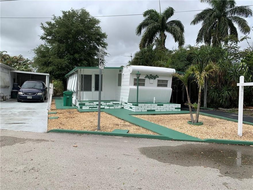 Beautifully renovated 2/1 with large family room. New Kitchen, vinyl floors, new bathroom, Home sits on canal front lot and features a carport too. You own the land in this park, with a super low month HOA bill of $80.  HOA states it is HOPA verified one buyer must be at least 55 years old. New Fridge and Stove to be installed before closing. CASH ONLY. Seller will consider holding mortgage with full price offer. 12% interest only. Can Rent after 1 year. similar rentals going to $1600-$1800 Beautifully renovated 2/1 with large family room. New Kitchen, vinyl floors, new bathroom, Home sits on canal front lot and features a carport too. You own the land in this park, with a super low month HOA bill of $80.  HOA states it is HOPA verified one buyer must be at least 55 years old. New Fridge and Stove to be installed before closing. CASH ONLY. Seller will consider holding mortgage with full price offer. 12% interest only. Can Rent after 1 year. similar rentals going to $1600-$1800