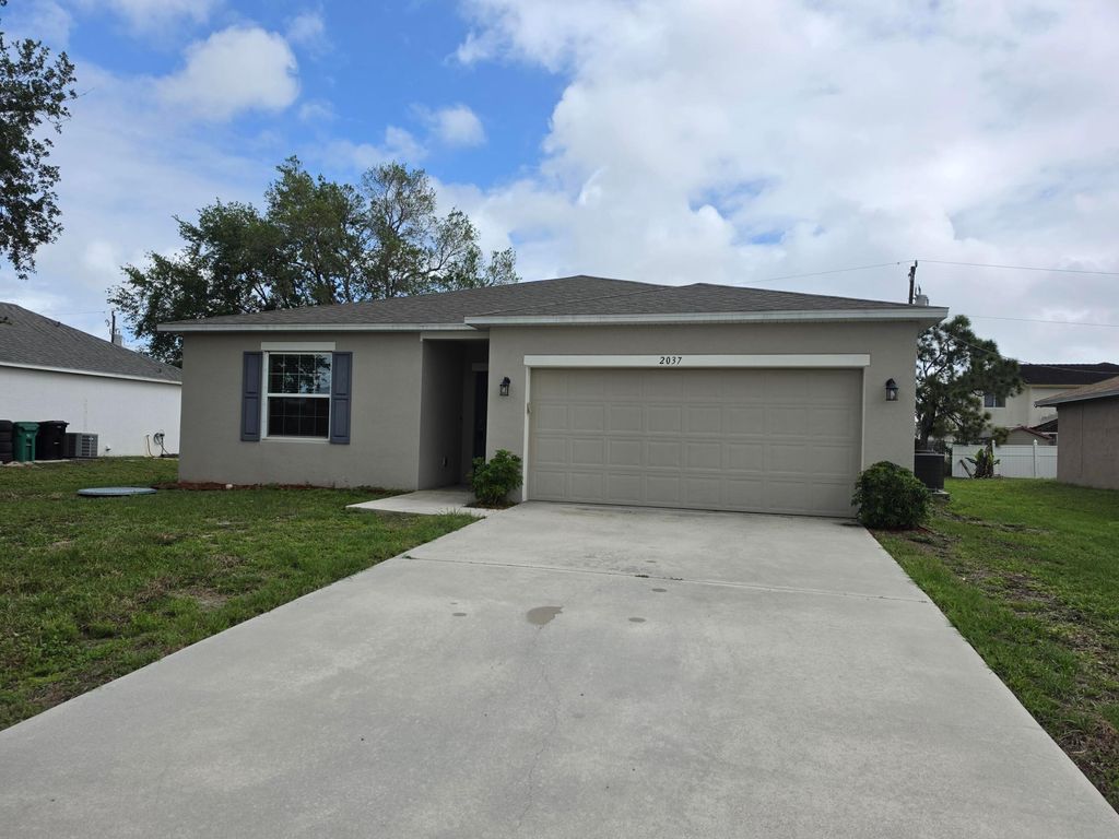 Photo of 2037 SW Mcallister Lane, Port Saint Lucie, FL 34953 (MLS # B26010341)