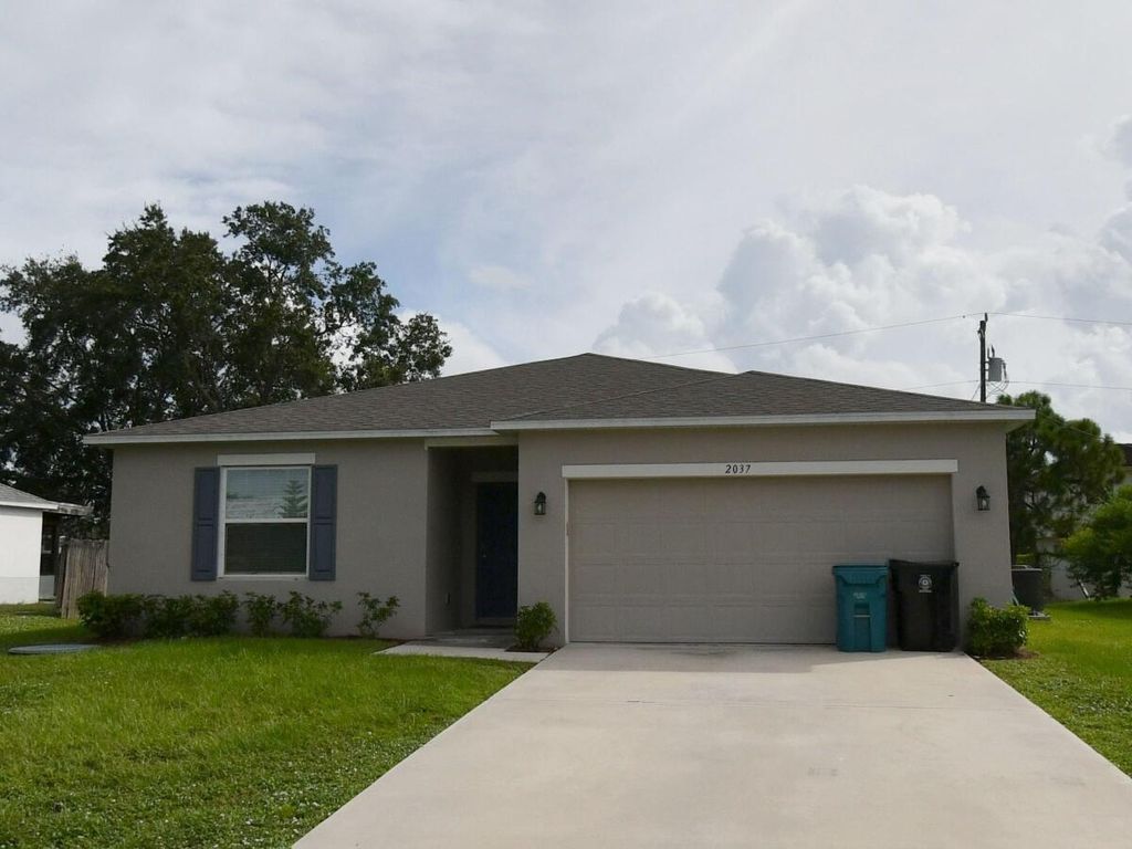 Photo of 2037 SW Mcallister Lane, Port Saint Lucie, FL 34953 (MLS # B26010341)