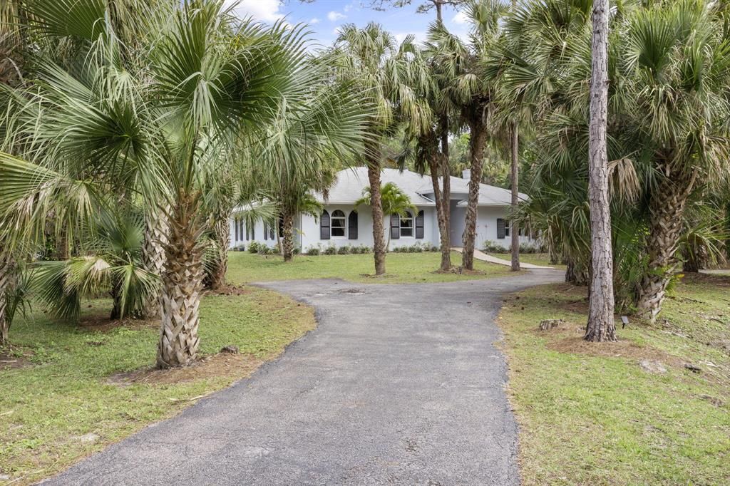 Photo of 9417 Whippoorwill Trail, Jupiter, FL 33478 (MLS # R10862882)