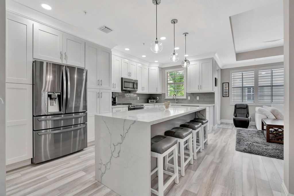 Photo of 2625 Ravella Lane, Palm Beach Gardens, FL 33410 (MLS # R11075995)