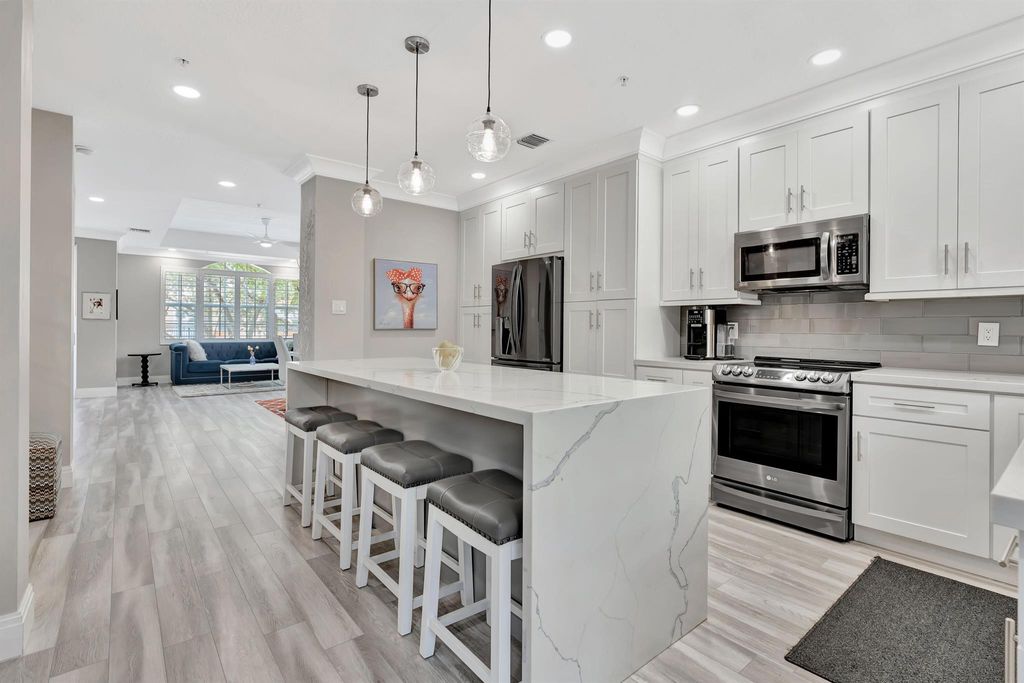 Photo of 2625 Ravella Lane, Palm Beach Gardens, FL 33410 (MLS # R11075995)