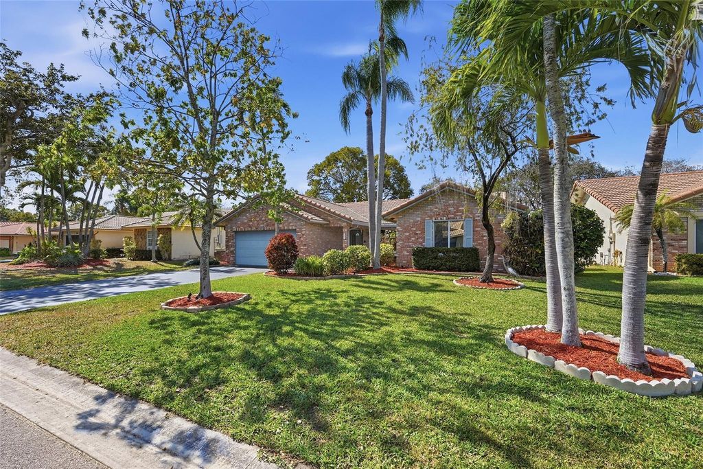 Photo of 392 NW 113th Terrace, Coral Springs, FL 33071 (MLS # F10554906)