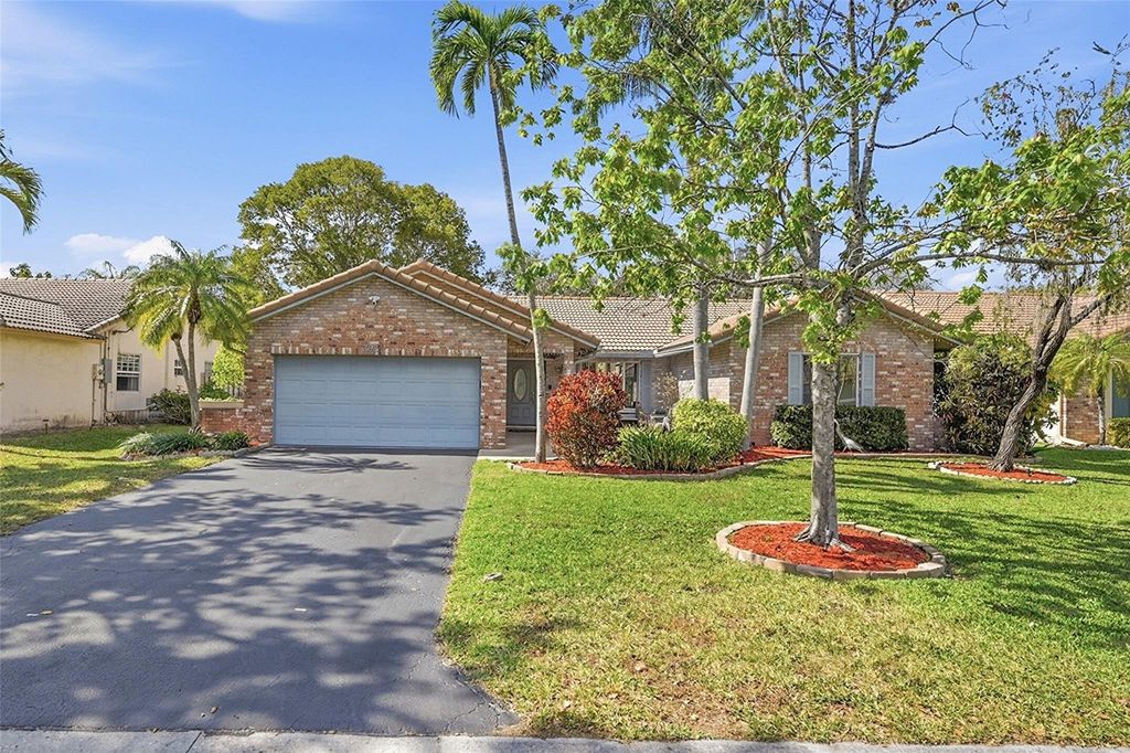 Photo of 392 NW 113th Terrace, Coral Springs, FL 33071 (MLS # F10554906)