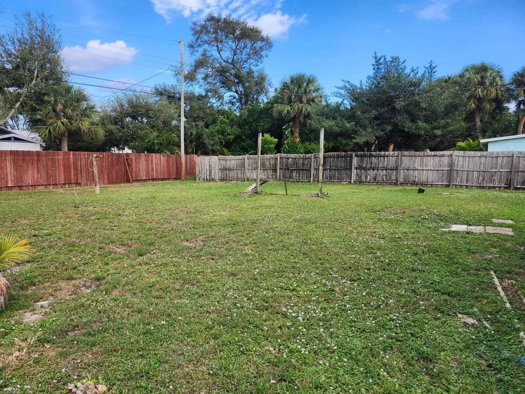 Photo of 531 Date Palm Drive, Lake Park, FL 33403 (MLS # R11138327)