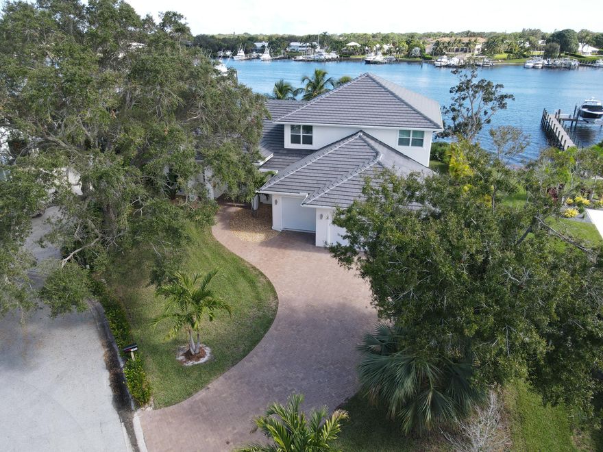 New luxury waterfront construction with deep water dockage!  5540 total sqft, 3542 sqft under air. Rare opportunity to purchase new build, 4 bedroom/4 bath direct open water view in manatee pocket! Deep water dock + boat lift. Exclusive Mariner's Cay gated community.  Impact windows, double fridges, two-story, double mater bedrooms, open plan living. Oversized 3 car garage, swimming pool.