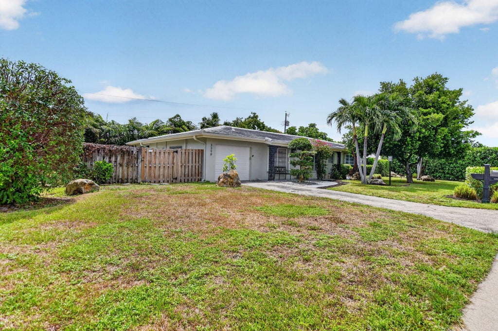 Photo of 3398 NE 5TH Avenue, Boca Raton, FL 33431 (MLS # B26061035)