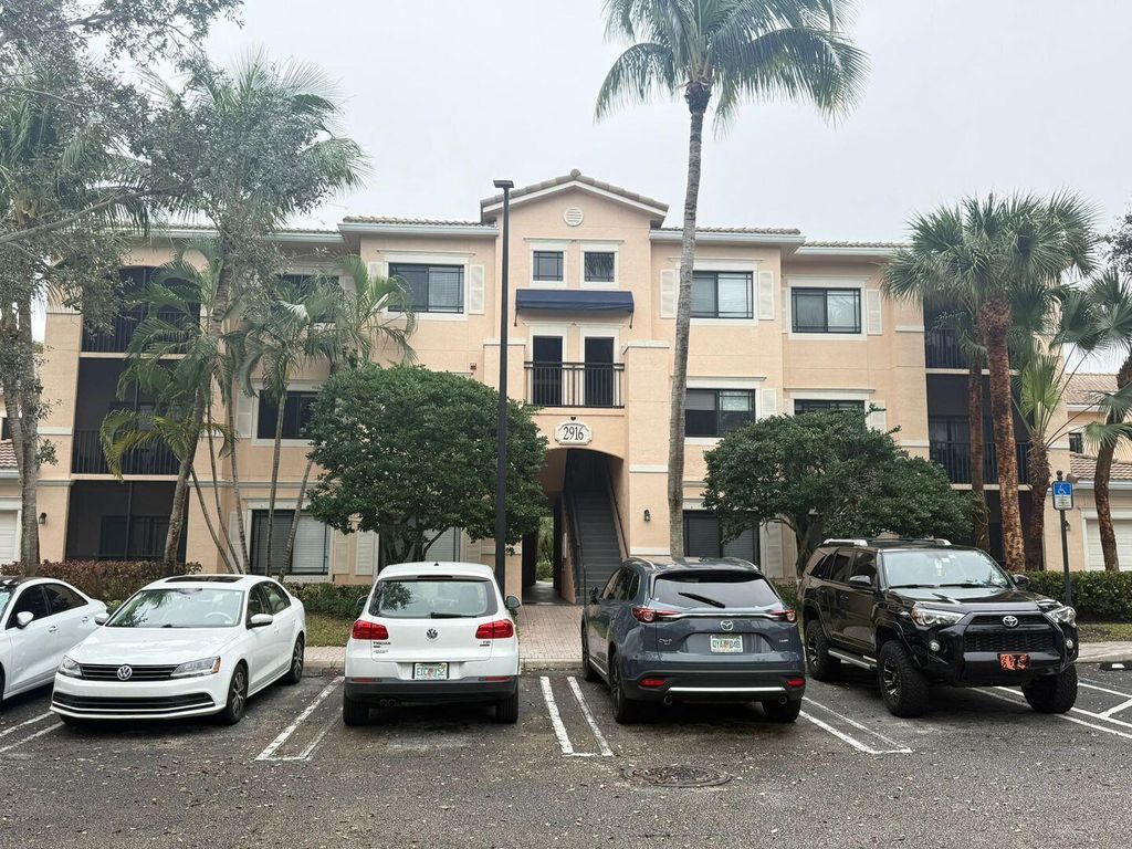 Photo of 2916 Tuscany Ct #303, Palm Beach Gardens, FL 33410 (MLS # R11063209)