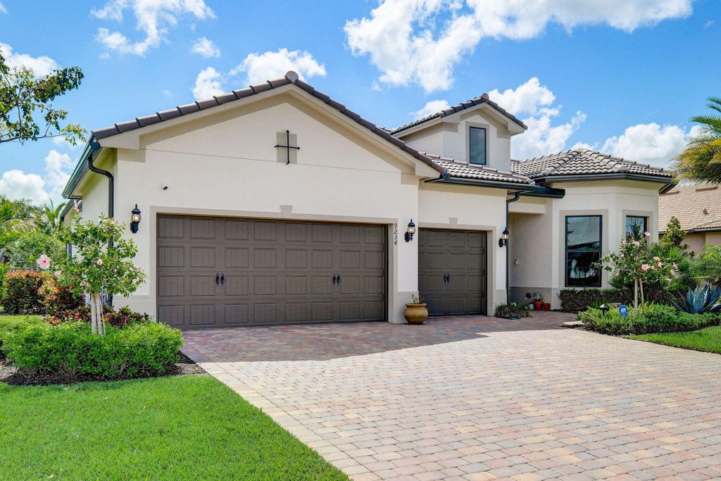 Photo of 9234 Balsamo Drive, Palm Beach Gardens, FL 33412 (MLS # B26020325)