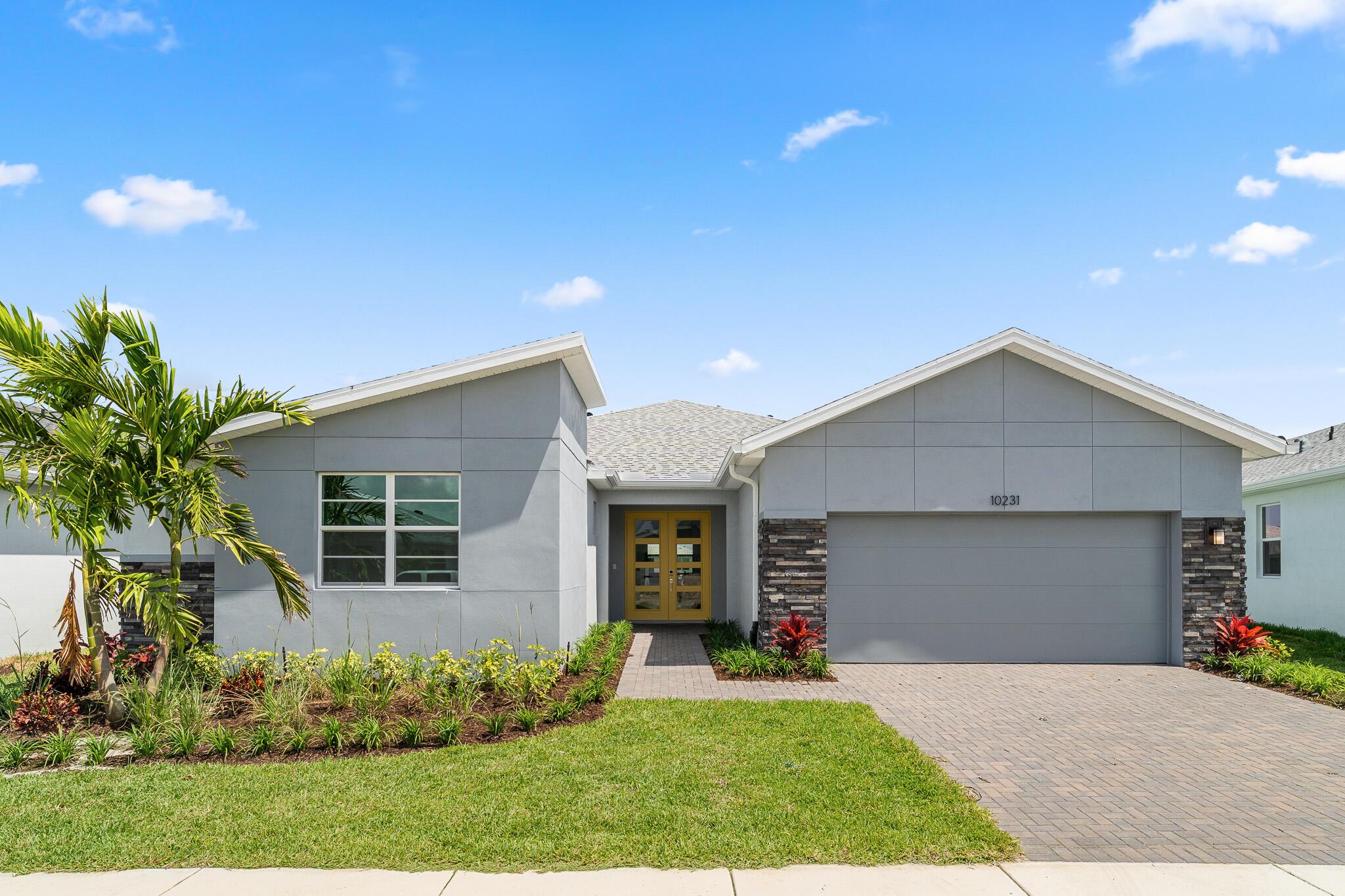 The Biscayne Bay is a 2,750 sq. ft. 1-story home that offers 4 bedrooms, 2.5 baths and a 2-car garage. This thoughtfully designed gem greets you with peek a boo windows as you approach the font door and the welcoming foyer greets you with the flex room and powder room just off to the side. The spacious kitchen offers generous cabinet space and countertops with an island breakfast bar. The kitchen overlooks the Great Room and dining area. A sliding glass door in the Great Room leads to the covered lanai. The three secondary bedrooms share a hall bath with double sinks along with the laundry room conveniently located nearby. The owner's suite is a relaxing retreat with a private bath and dual walk-in closets.