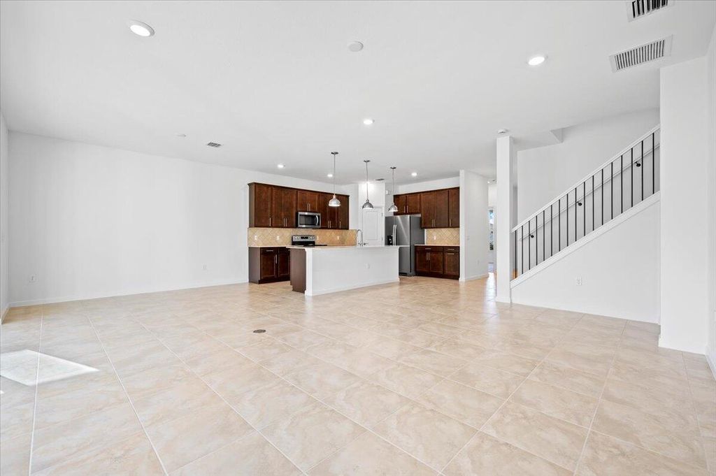 Photo of 9915 SW Meridian Way, Stuart, FL 34997 (MLS # R10942774)