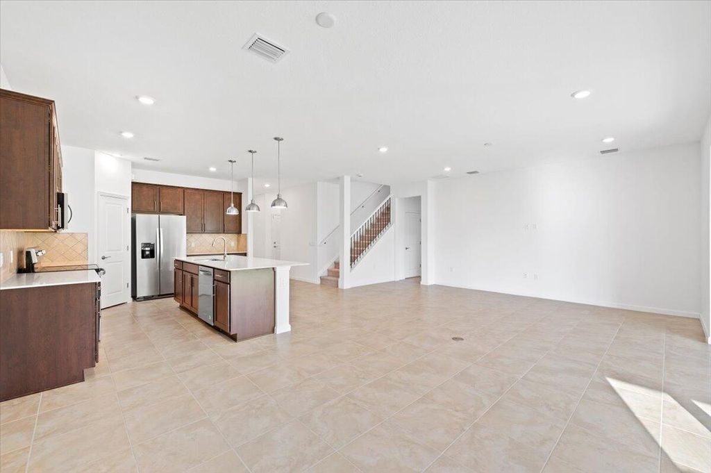 Photo of 9915 SW Meridian Way, Stuart, FL 34997 (MLS # R10942774)