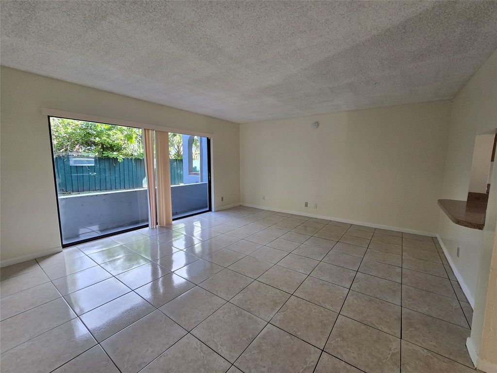 Photo of 1700 N Congress Ave #A-102, West Palm Beach, FL 33401 (MLS # F10481443)