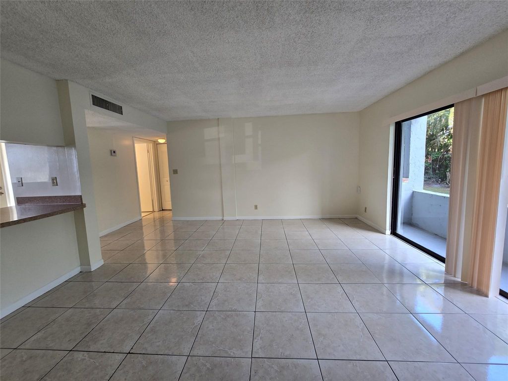 Photo of 1700 N Congress Avenue #A-102, West Palm Beach, FL 33401 (MLS # F10481443)