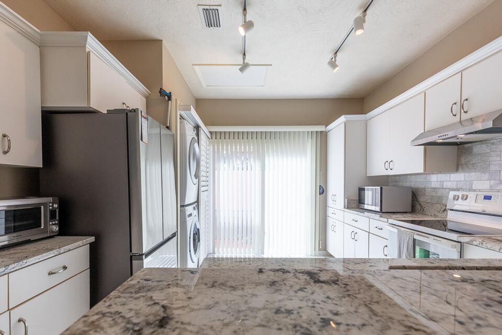 Photo of 3320 SE Sandpiper Circle, Port Saint Lucie, FL 34952 (MLS # R11104208)