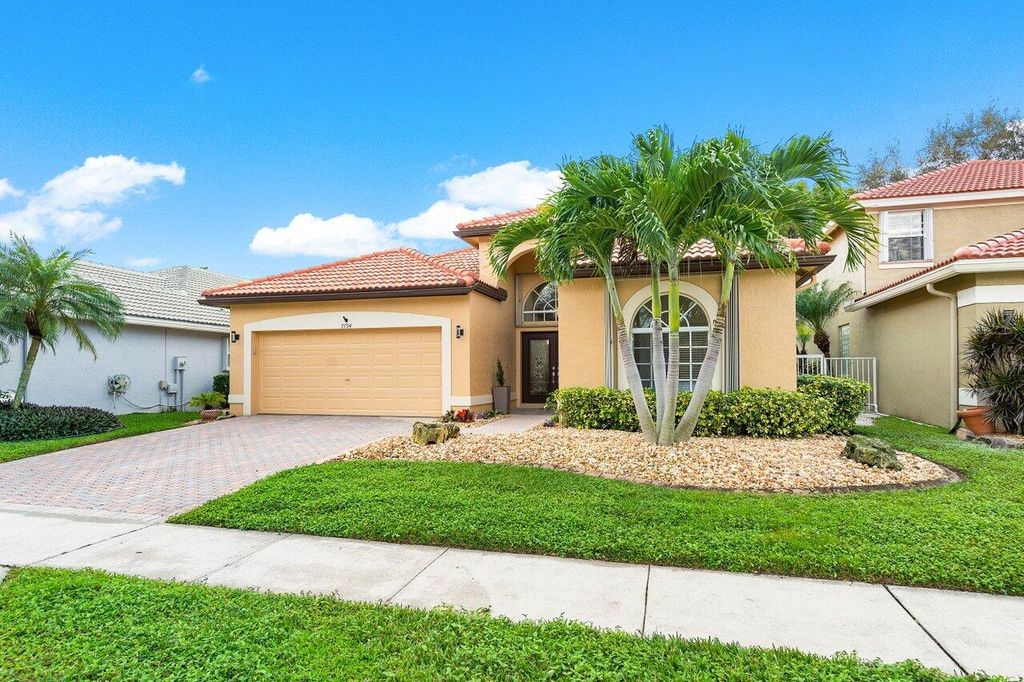 Photo of 7794 Edinburough Lane, Delray Beach, FL 33446 (MLS # R10951245)