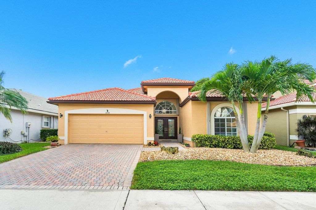 Photo of 7794 Edinburough Lane, Delray Beach, FL 33446 (MLS # R10951245)